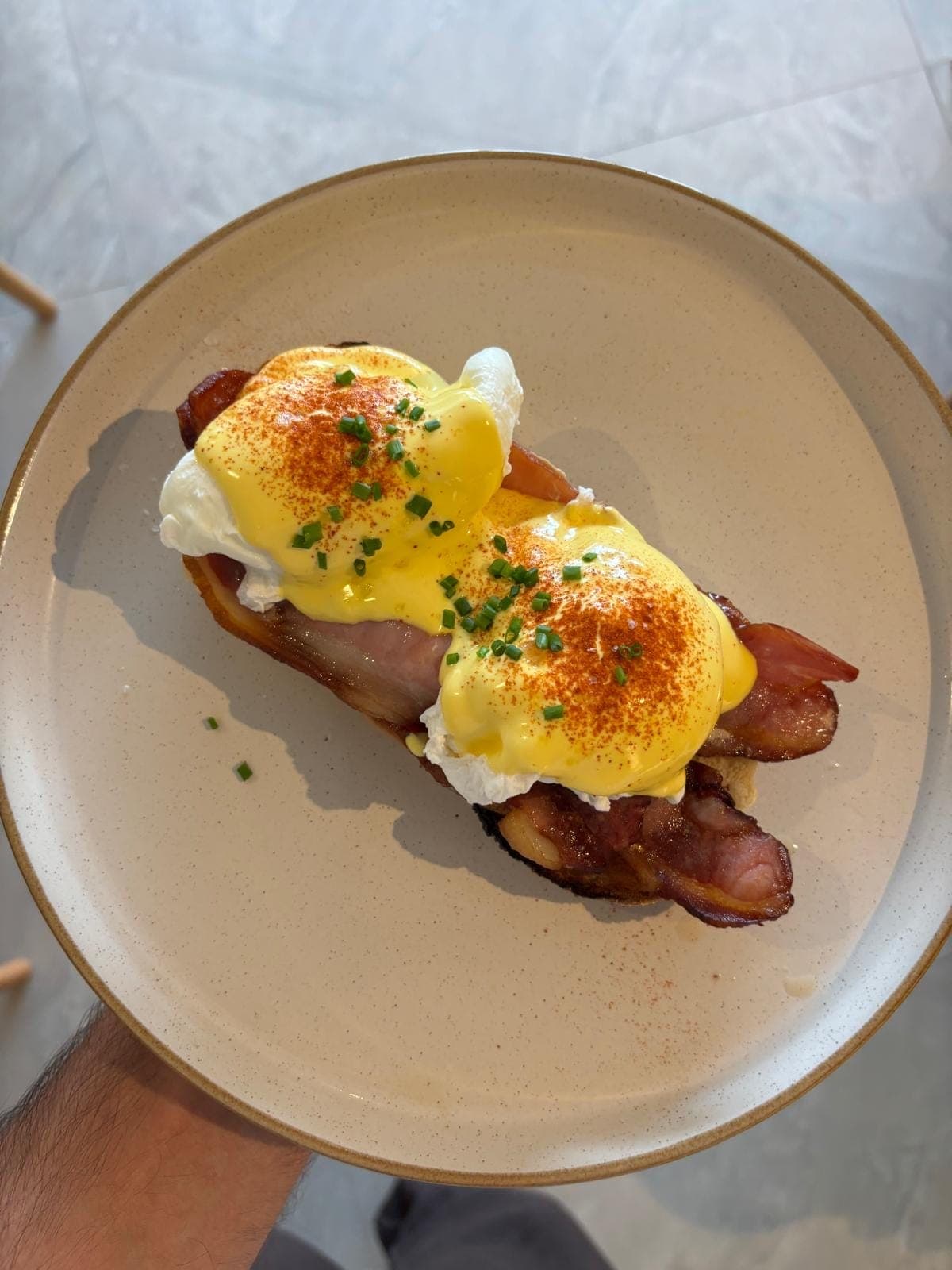 Eggs Benedict with poached eggs, crispy dry cured bacon and house hollandaise at TOAST & Co Derby